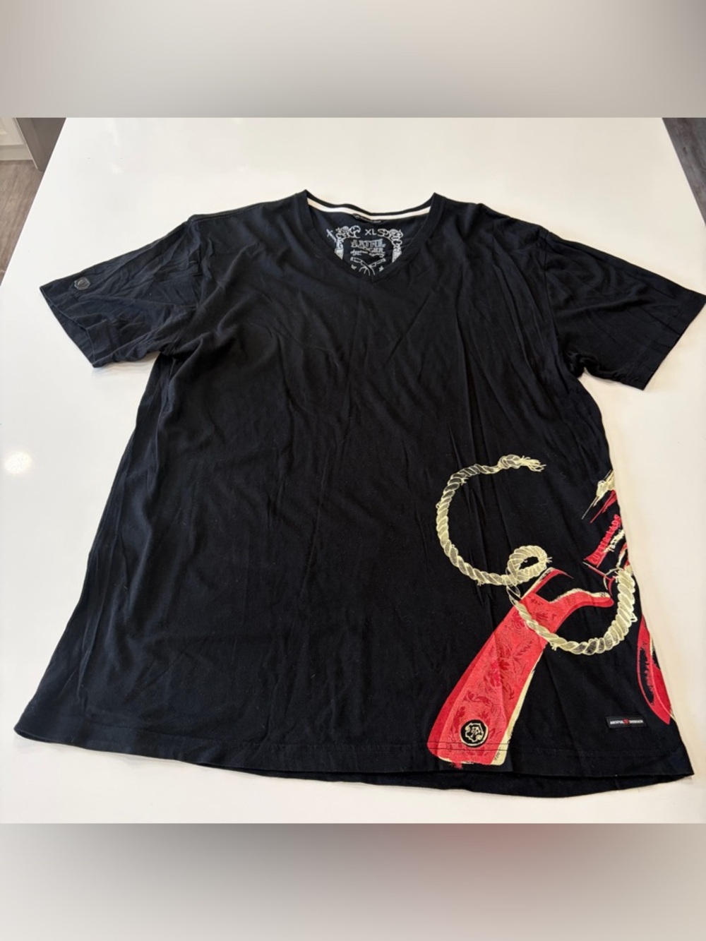 Artful Dodger Black Men's V-Neck Graphic Tee with Red & Gold Accents